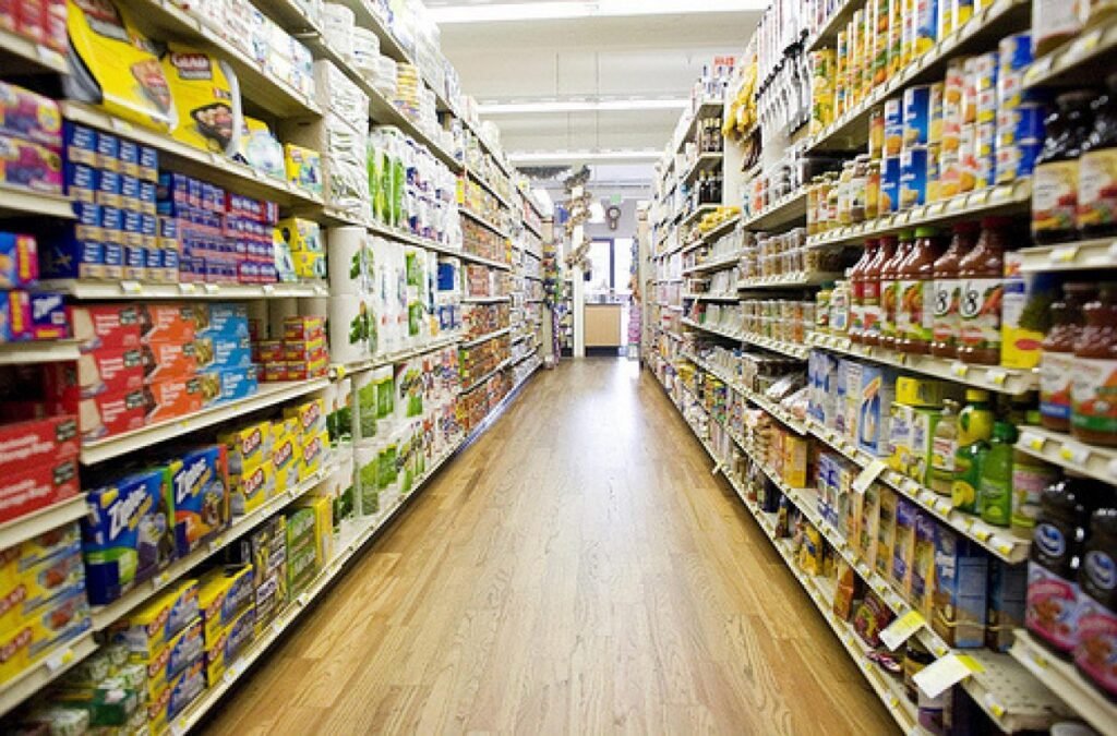 a store aisle with shelves of fmcg items